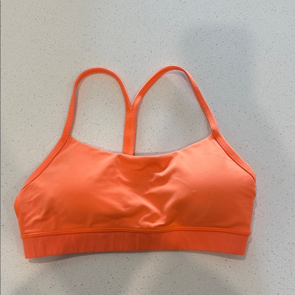 bright orange sports bra